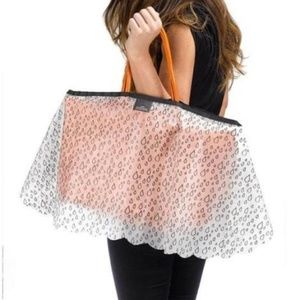 The Handbag Raincoat midi raindrop